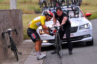 WAVRE BELGIUM AUGUST 17 Caleb Ewan of Australia and Team Lotto Soudal Yellow Leader Jersey Mechanic Mechanical Problem Bike Car during the 41st Tour de Wallonie 2020 Stage 2 a 1723km stage from Frasnes Lez Anvaing to Wavre TourdeWallonie TRW2020 on August 17 2020 in Wavre Belgium Photo by Luc ClaessenGetty Images
