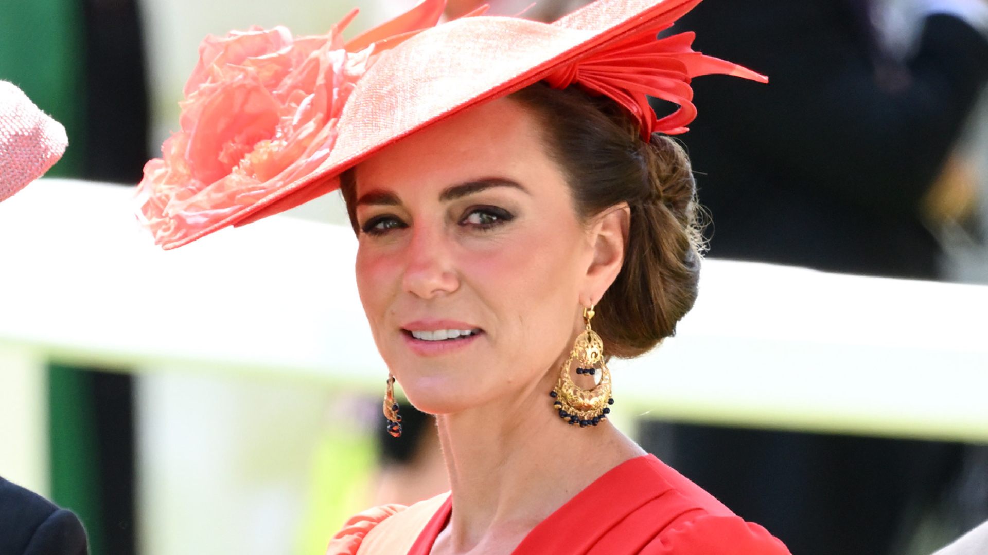 Kate Middleton wears a bright red hat and matching dress at Royal Ascot