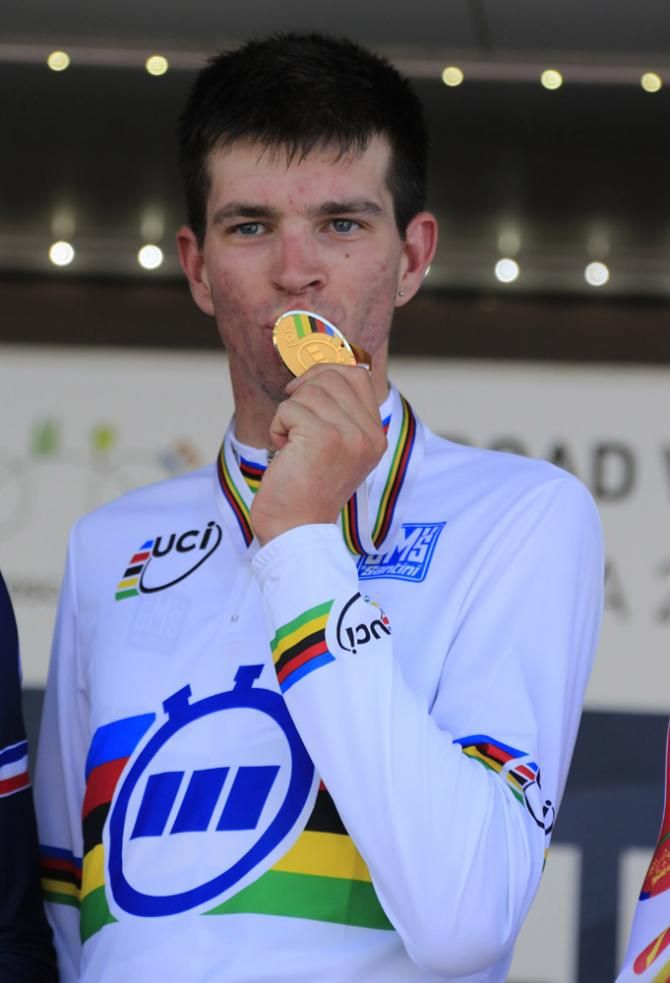 Damien Howson (Australia) with his gold medal and rainbow jersey after winning the U23 men's time trial world championship
