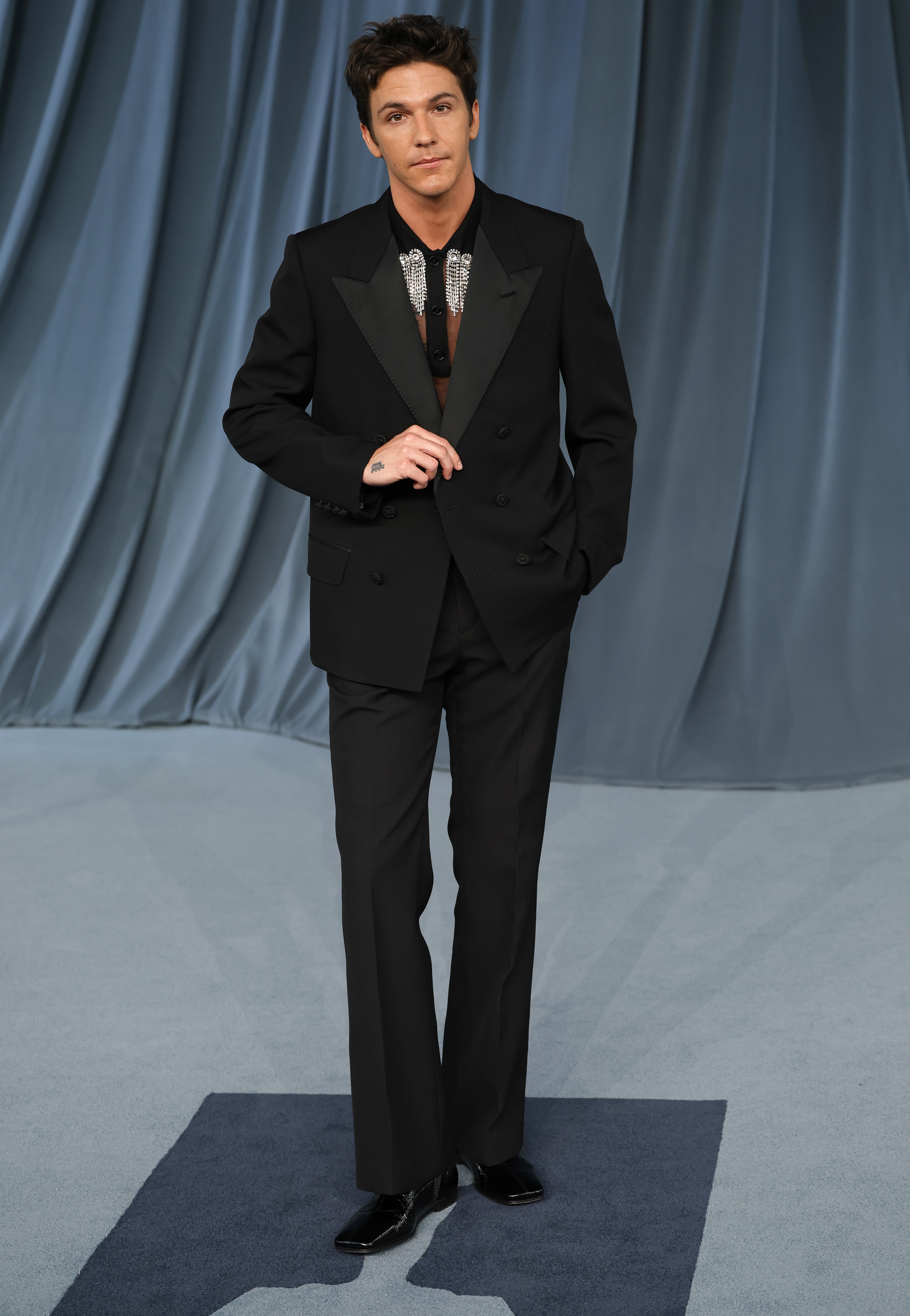 Role Model in a black suit and shirt with silver embellishing attends the 5th Annual Academy Museum Gala at the Academy Museum of Motion Pictures on October 18, 2025 in Los Angeles, California