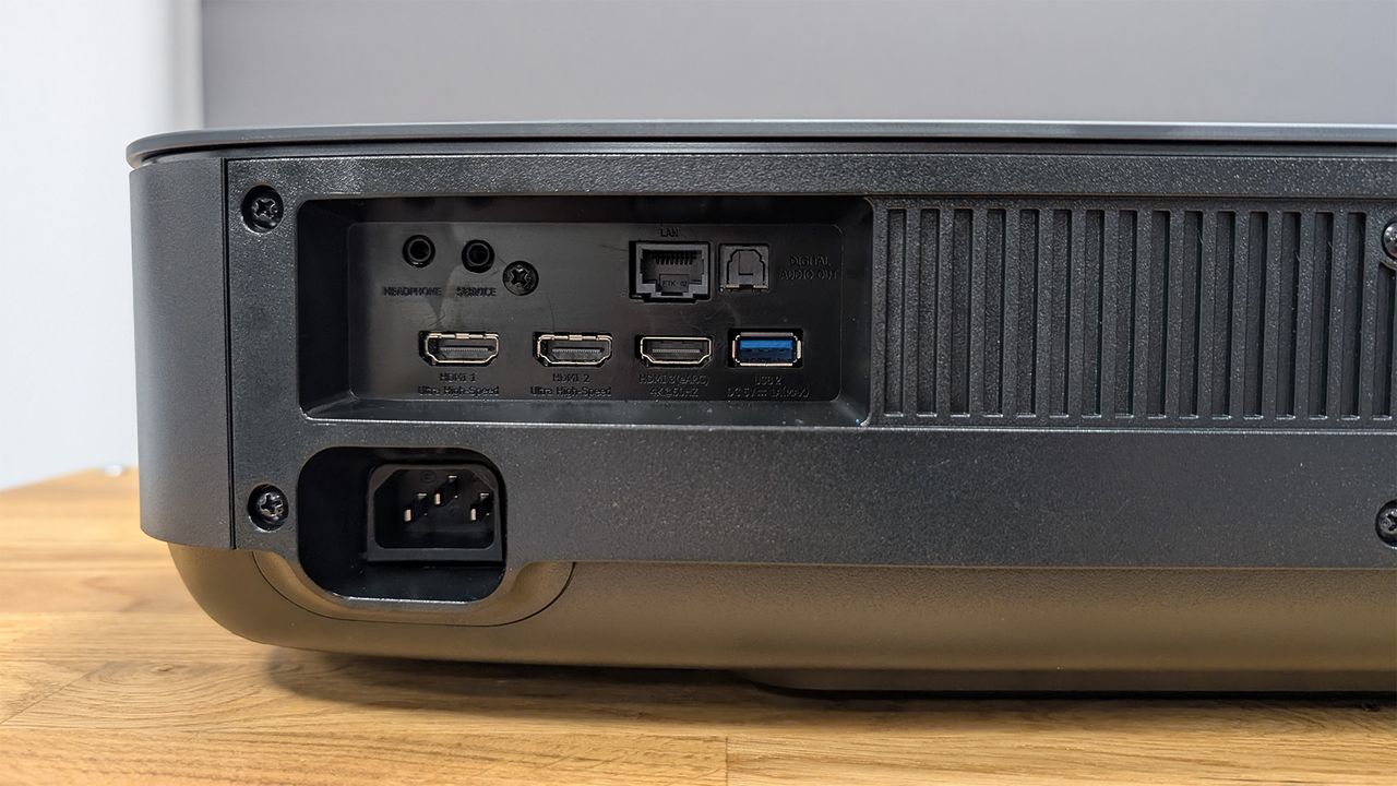 The rear panel of a Hisense PL2 UST projector, showing the connections.