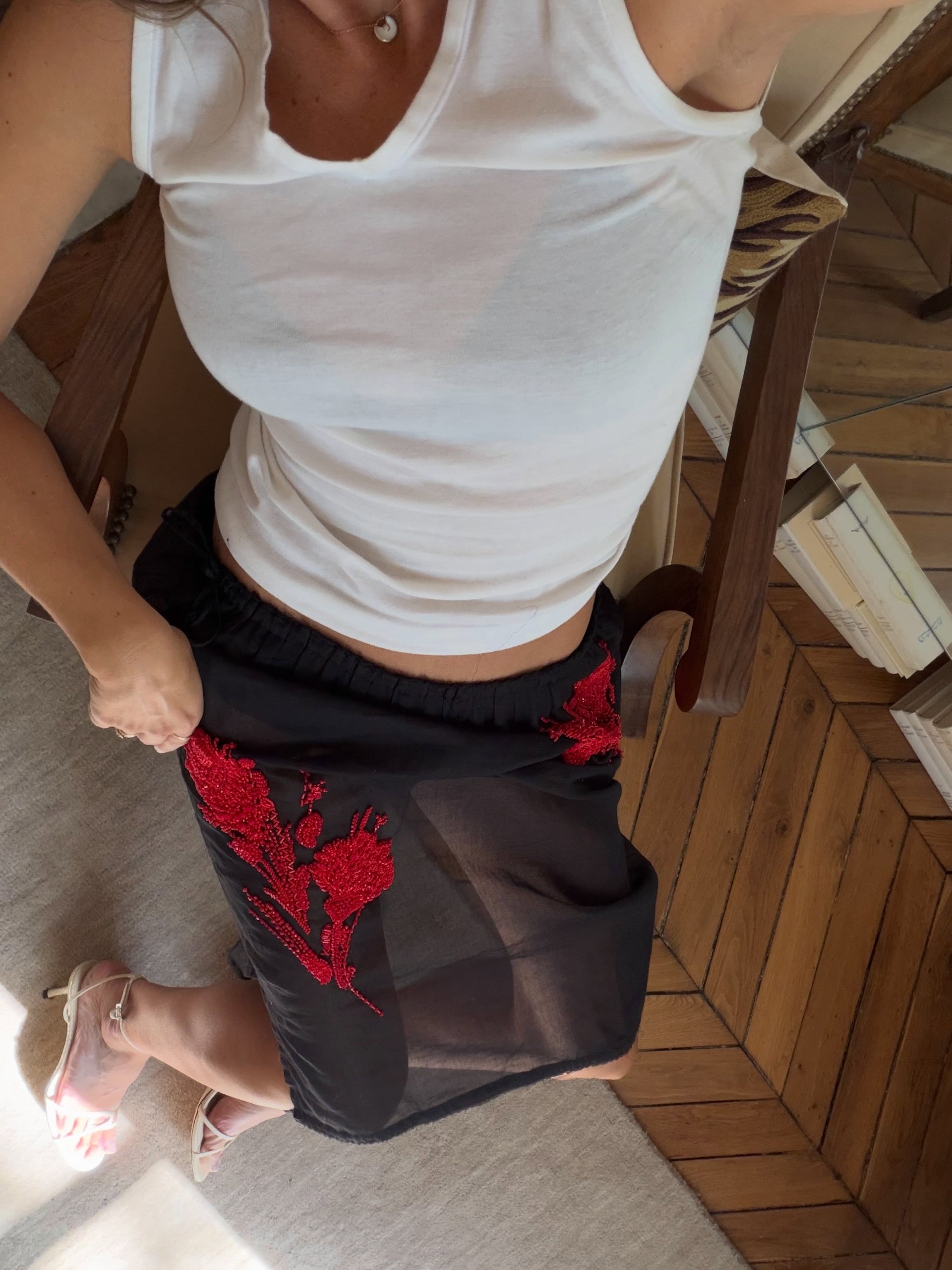 An image of @neridahtwist wearing a statement skirt, one of the biggest It girl trends for winter 2026.