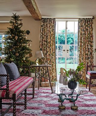 Christmas tree by fireplace