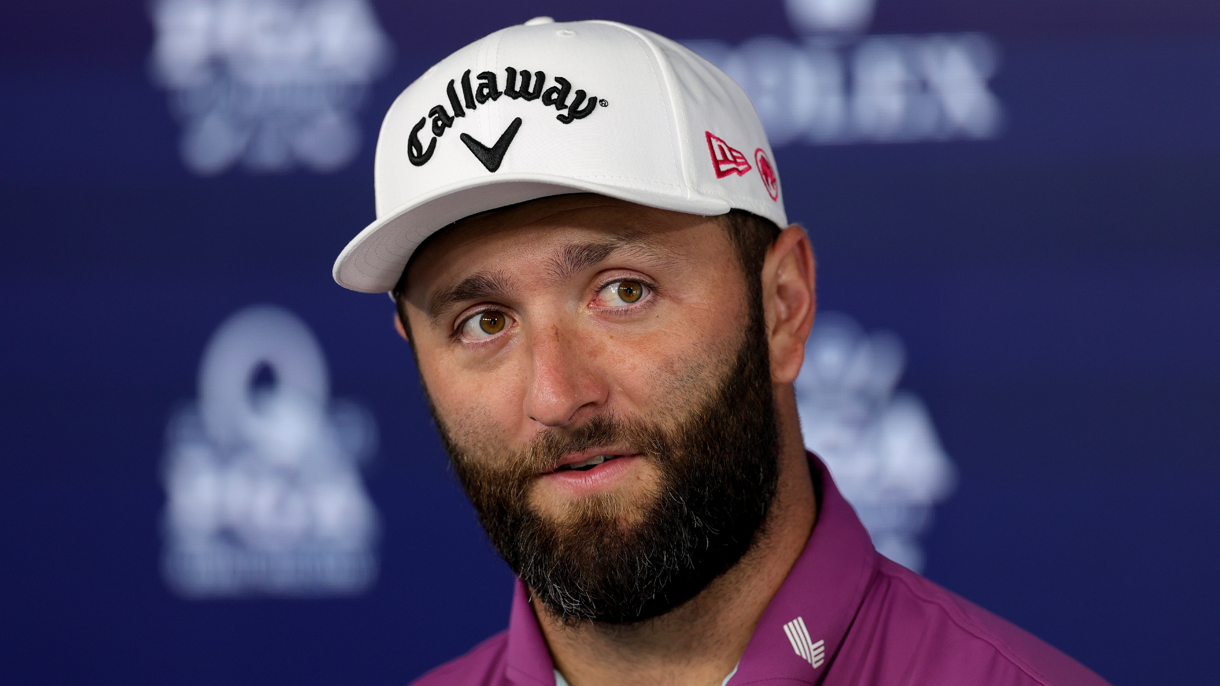 Jon Rahm talks to the media before the PGA Championship