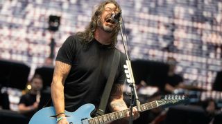 Dave Grohl performing onstage with Foo Fighters in 2025