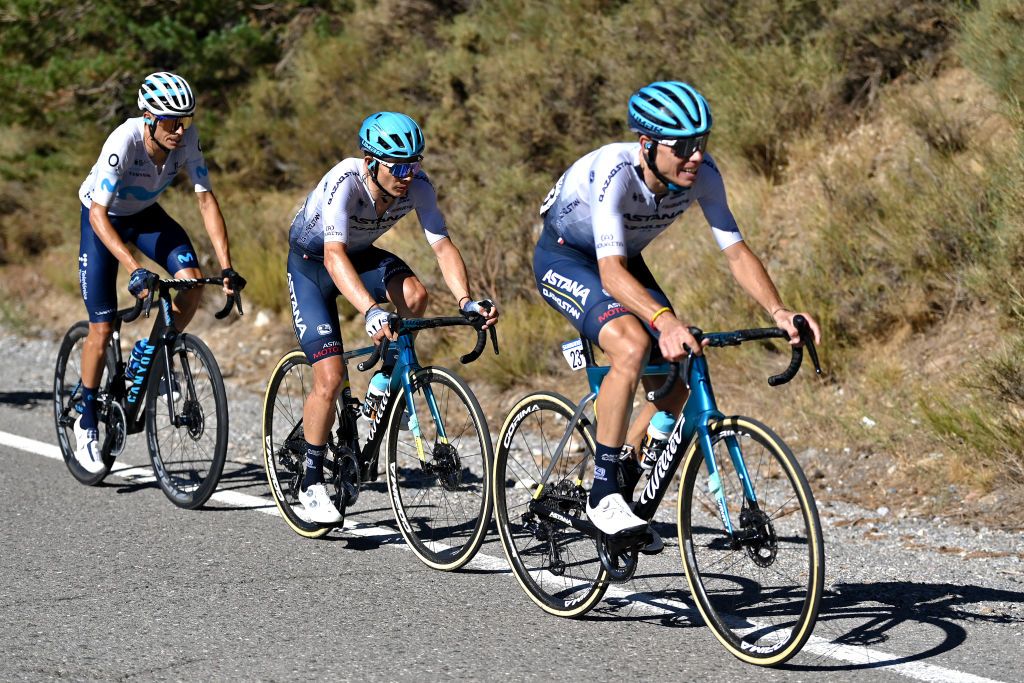SIERRA NEVADAGRANADA SPAIN SEPTEMBER 04 LR Enric Mas Nicolau of Spain and Movistar Team Miguel ngel Lpez Moreno of Colombia and Team Astana Qazaqstan and David De La Cruz Melgarejo of Spain and Team Astana Qazaqstan compete in the chase group during the 77th Tour of Spain 2022 Stage 15 a 1526km stage from Martos to Sierra Nevada Granada 2507m LaVuelta22 WorldTour on September 04 2022 in Sierra Nevada Spain Photo by Justin SetterfieldGetty Images