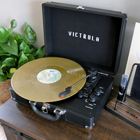 Buy a Victrola record player - get a free album