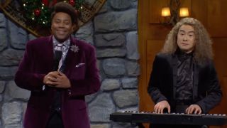 Kenan Thompson and Bowen Yang in the Tree Lighting Gig sketch on SNL.