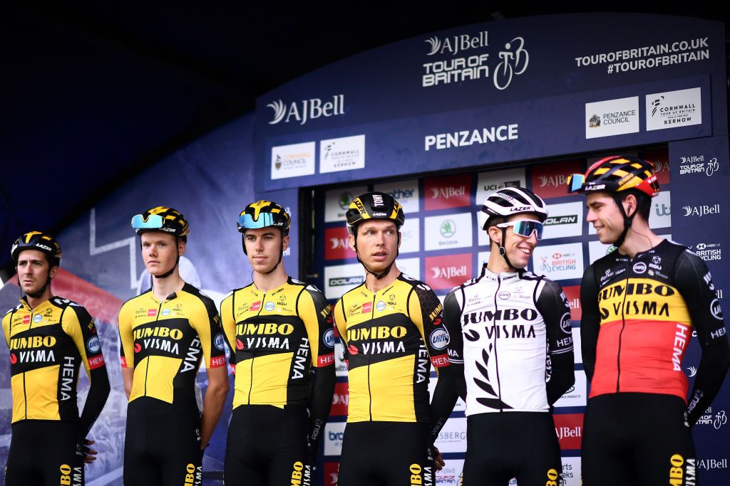 BODMIN ENGLAND SEPTEMBER 05 Wout Van Aert of Belgium George Bennett of New Zealand Chris Harper of Australia Pascal Eenkhoorn of Netherlands Gijs Leemreize of Netherlands Tony Martin of Germany and Team Jumbo Visma during the team presentation prior to the 17th Tour of Britain 2021 Stage 1 a 1808km stage from Penzance to Bodmin TourofBritain TourofBritain on September 05 2021 in Bodmin England Photo by Harry TrumpGetty Images