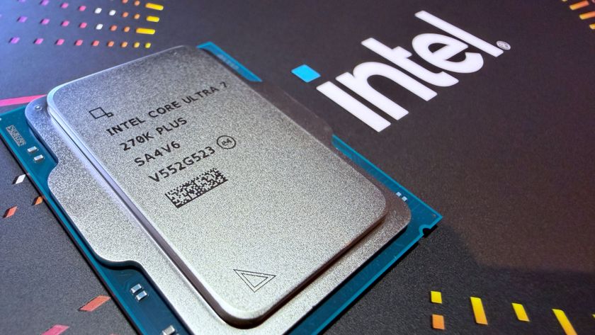 A photo of an Intel Core Ultra 7 2750K Plus processor, resting against a colorful, Intel-branded box