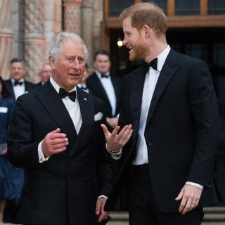 King Charles and Prince Harry in tuxes at a black tie event