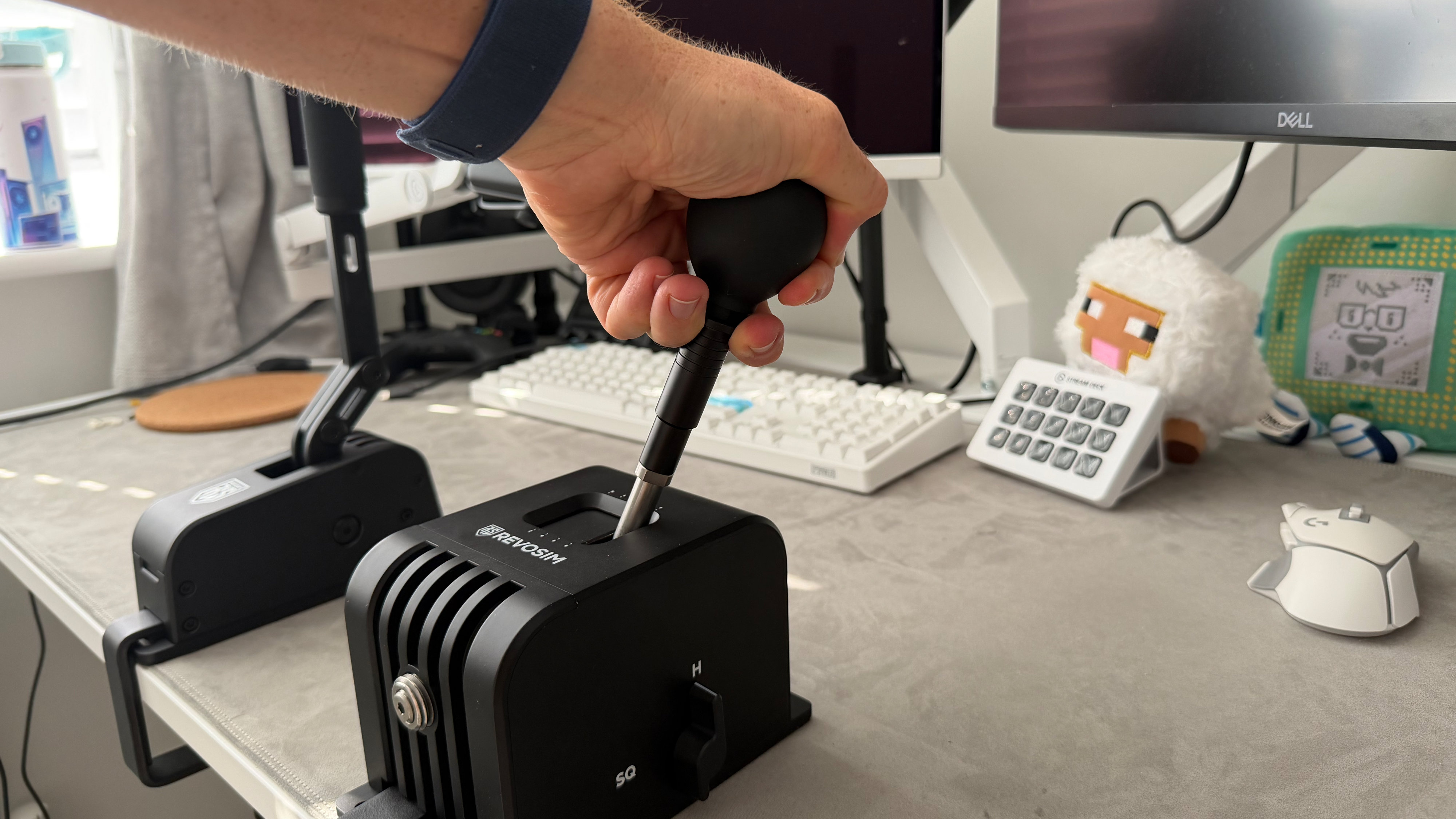 A reviewer using the H-shifter for the Revosim's RS Pure bundle