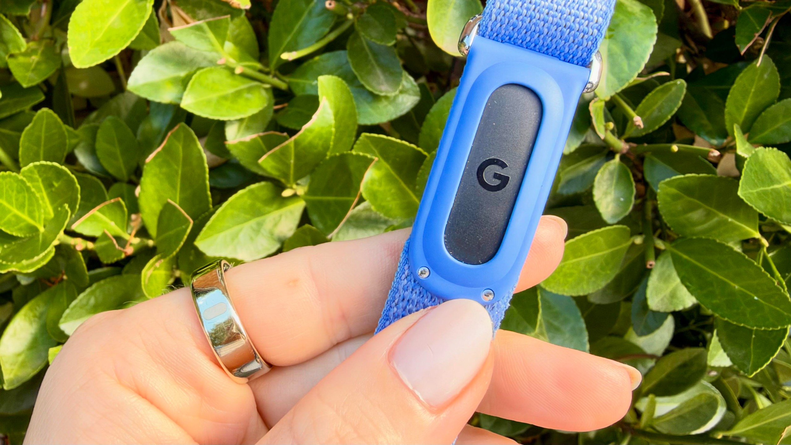 a photo of the Oura Ring 5 and Fitbit Air 