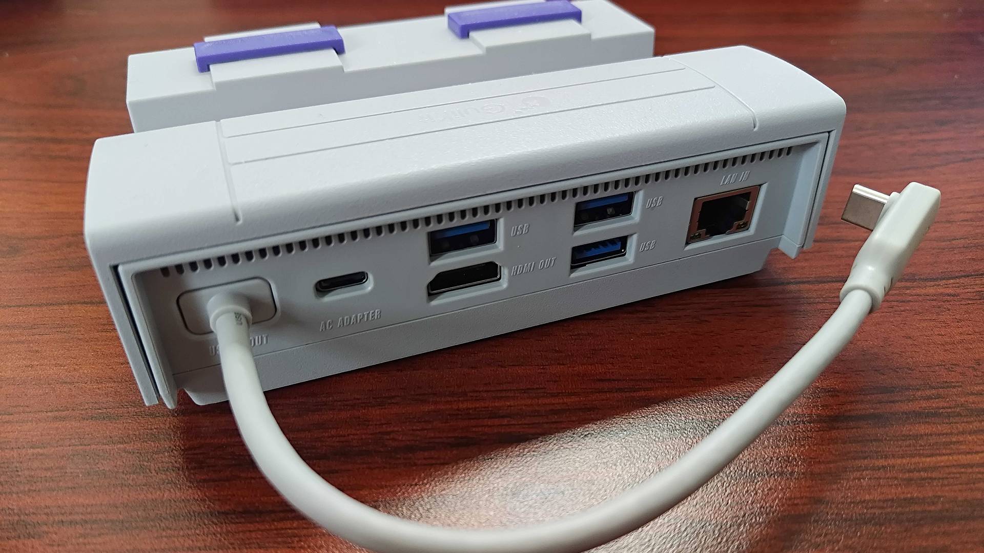 Back view of Gulikit Steam Deck dock with ports and USB-C cable in view.