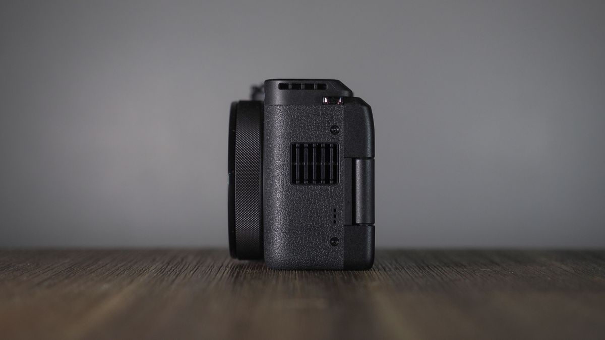 Canon PowerShot V1 on a wooden surface