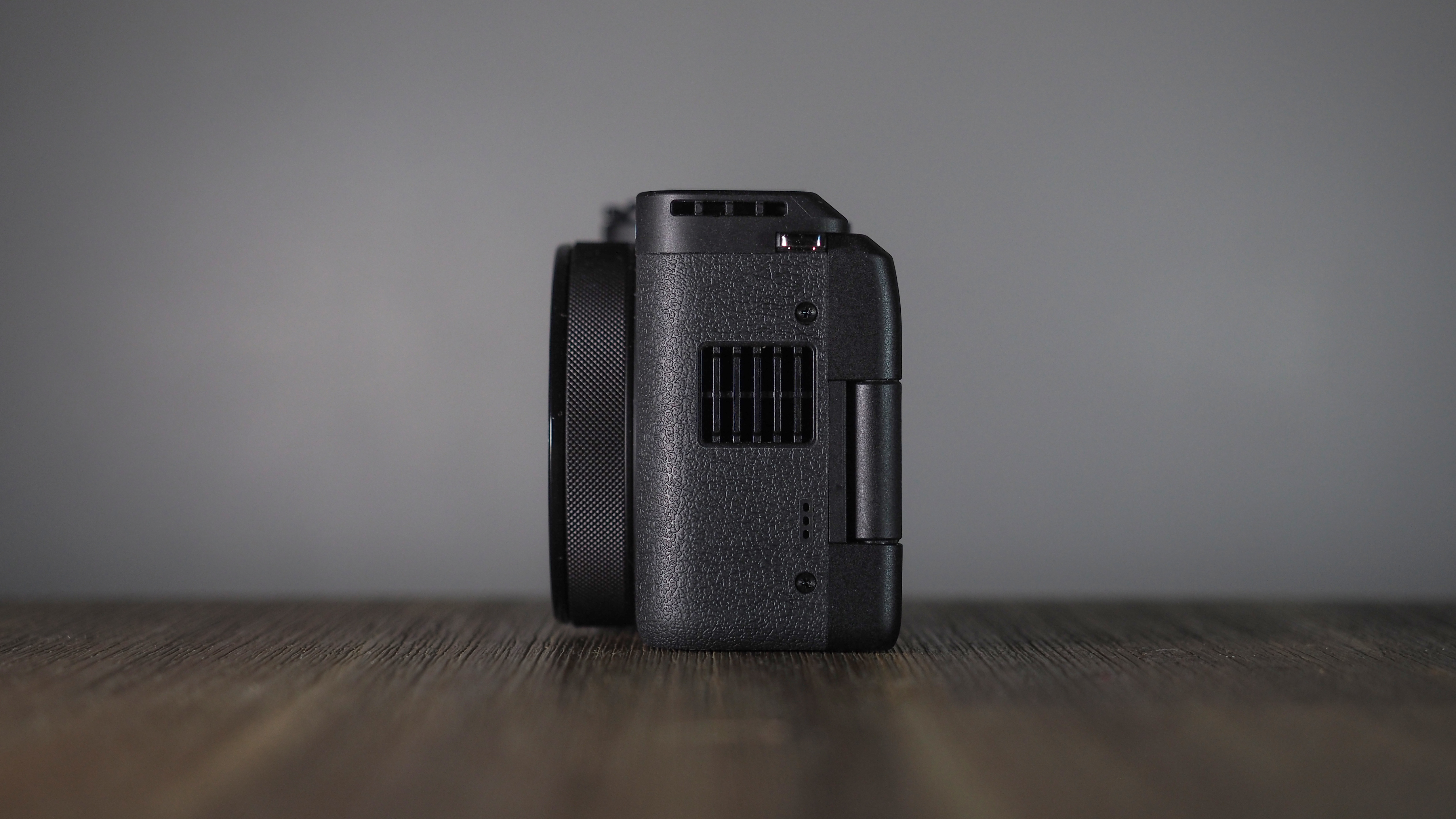 Canon PowerShot V1 on a wooden surface