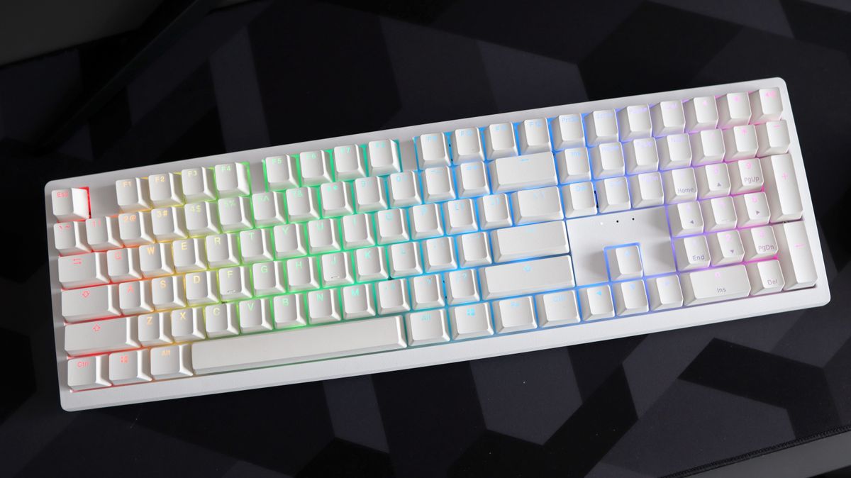 Ducky Zero 6108 gaming keyboard in white on a desk.