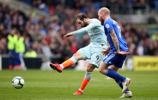 Chelsea’s Gonzalo Higuain, left, has a shot on goal