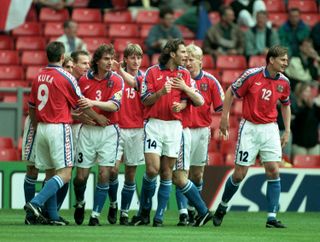 Czech Republic players celebrate a goal against Russia at Euro 96.