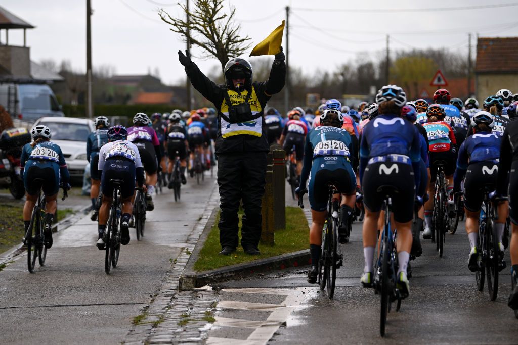 BRUGGE BELGIUM MARCH 23 Security signal during the 6th Exterioo Womens Classic BruggeDe Panne 2023 a 1631km one day race from Brugge to De Panne UCIWWT on March 23 2023 in Brugge Belgium Photo by Luc ClaessenGetty Images
