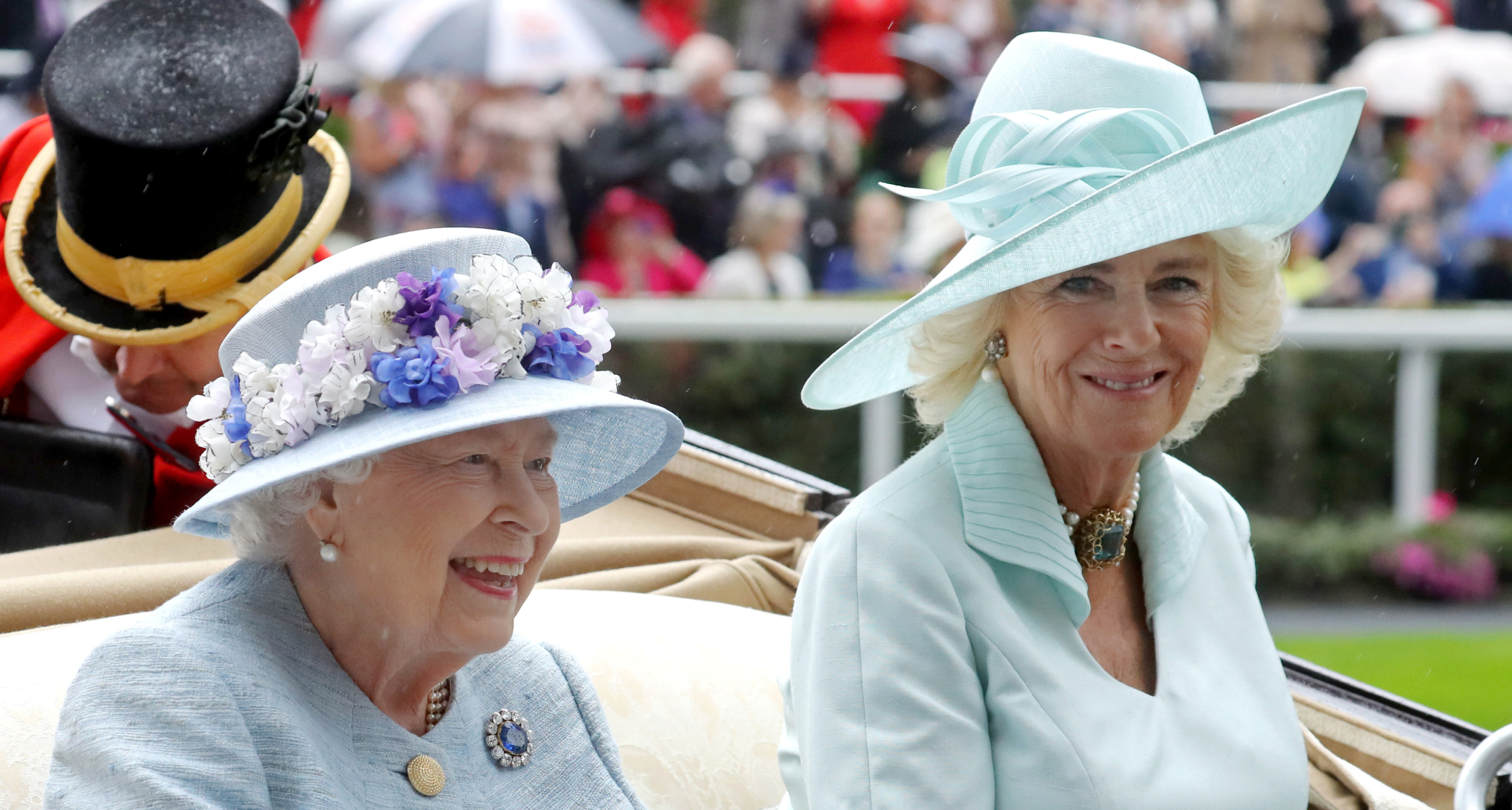 Queen Elizabeth and Queen Camilla riding in a carriage at Royal Ascot