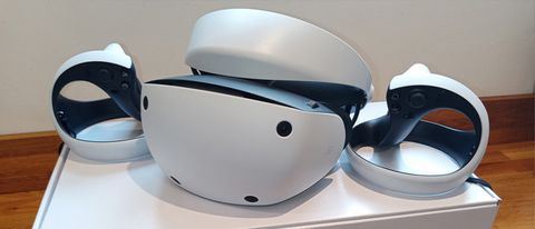 PSVR 2 review; a white VR headset on a white box