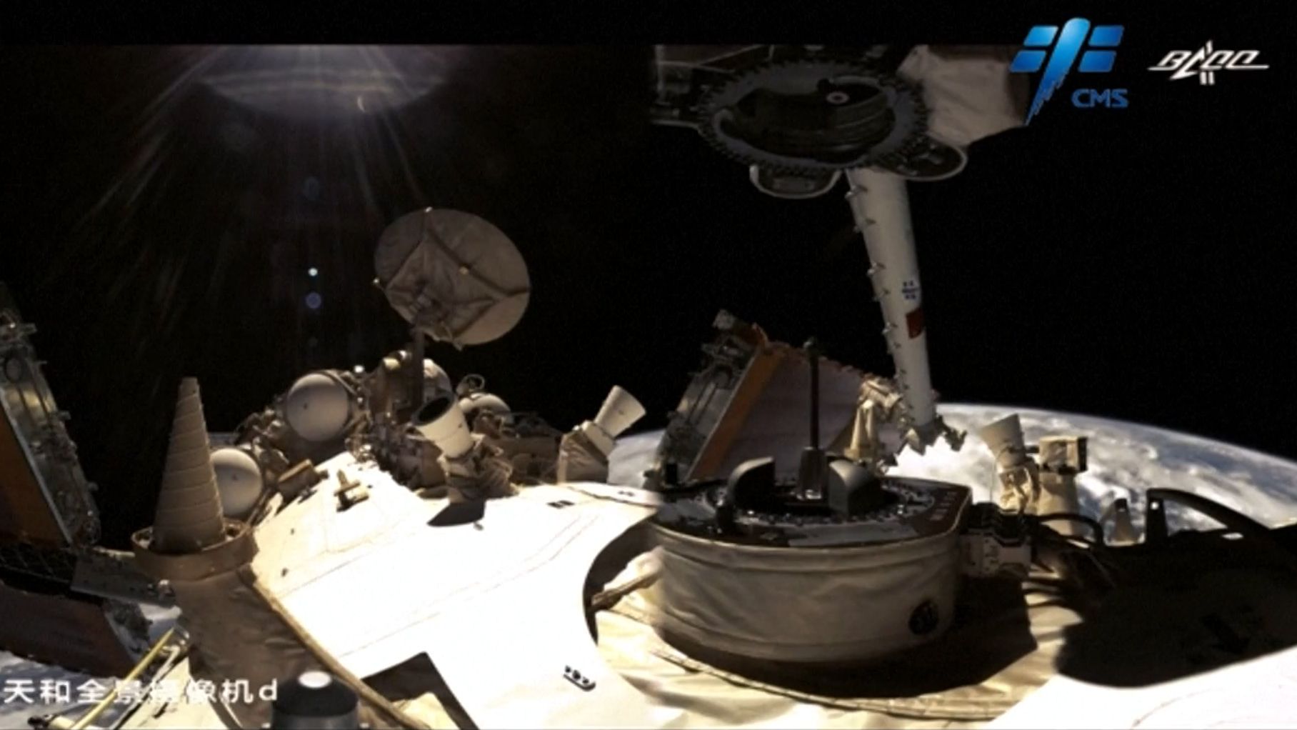 See a large robotic arm 'crawl' across China's space station (video ...