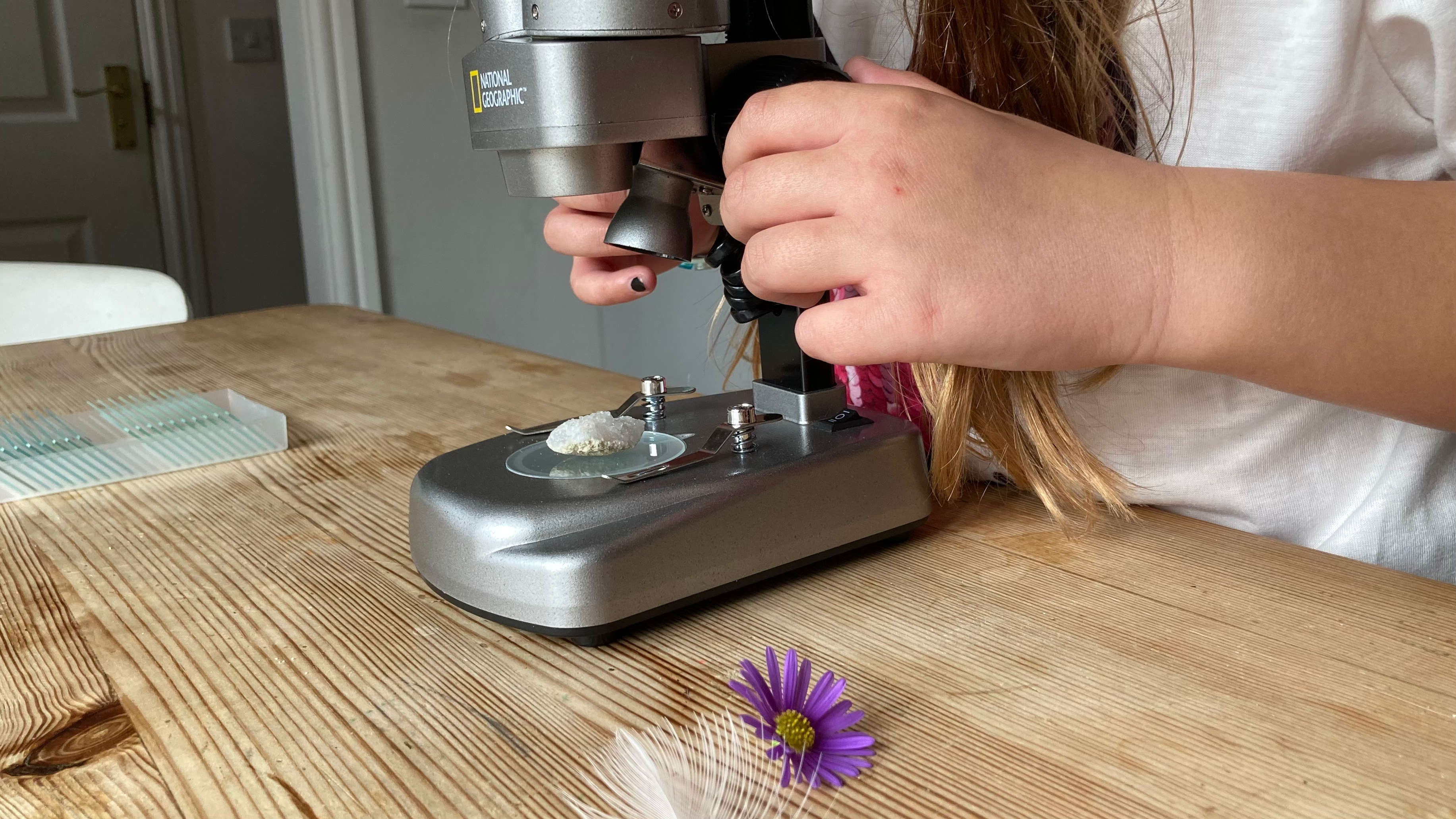 National Geographic Ultimate Dual Stereo Microscope being used on a table