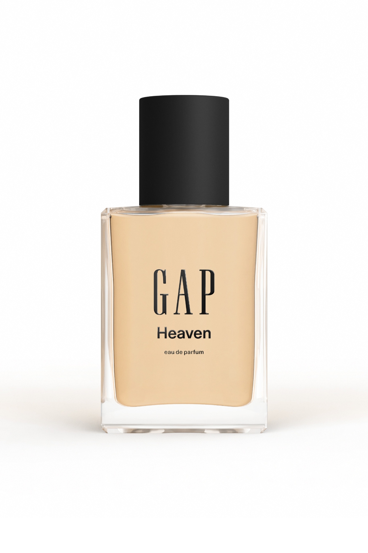 a clear glass bottle of gap heaven perfume