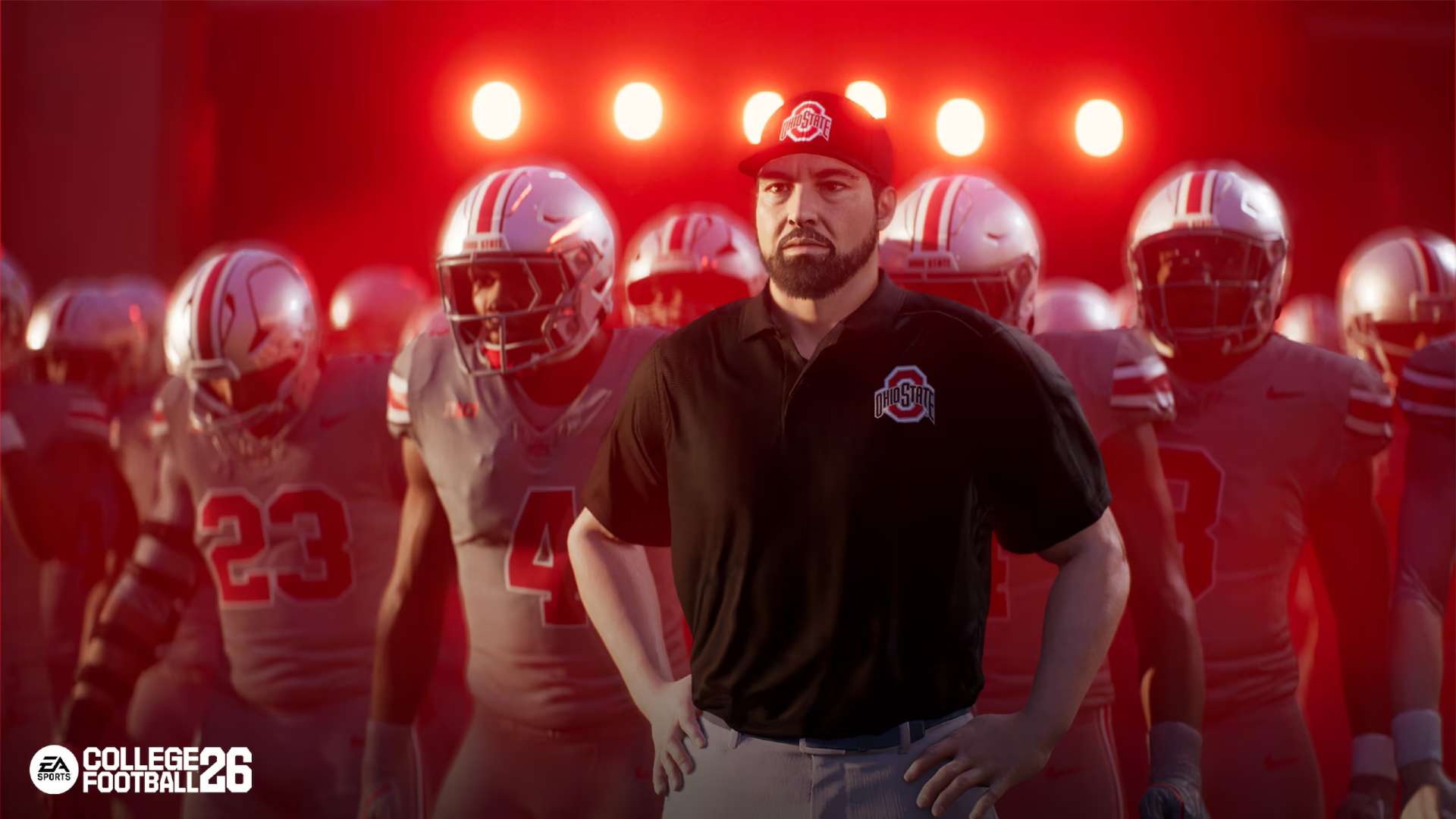 College Football 26: a coach standing in front of his team