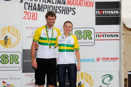 Ben Mather and Heather Logie pose in their new national championships jerseys.