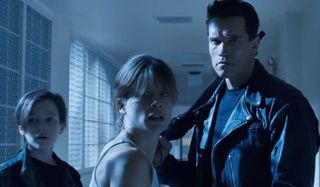Terminator 2: Judgement Day John Connor, Sarah Connor, and the T-800 stop and stare