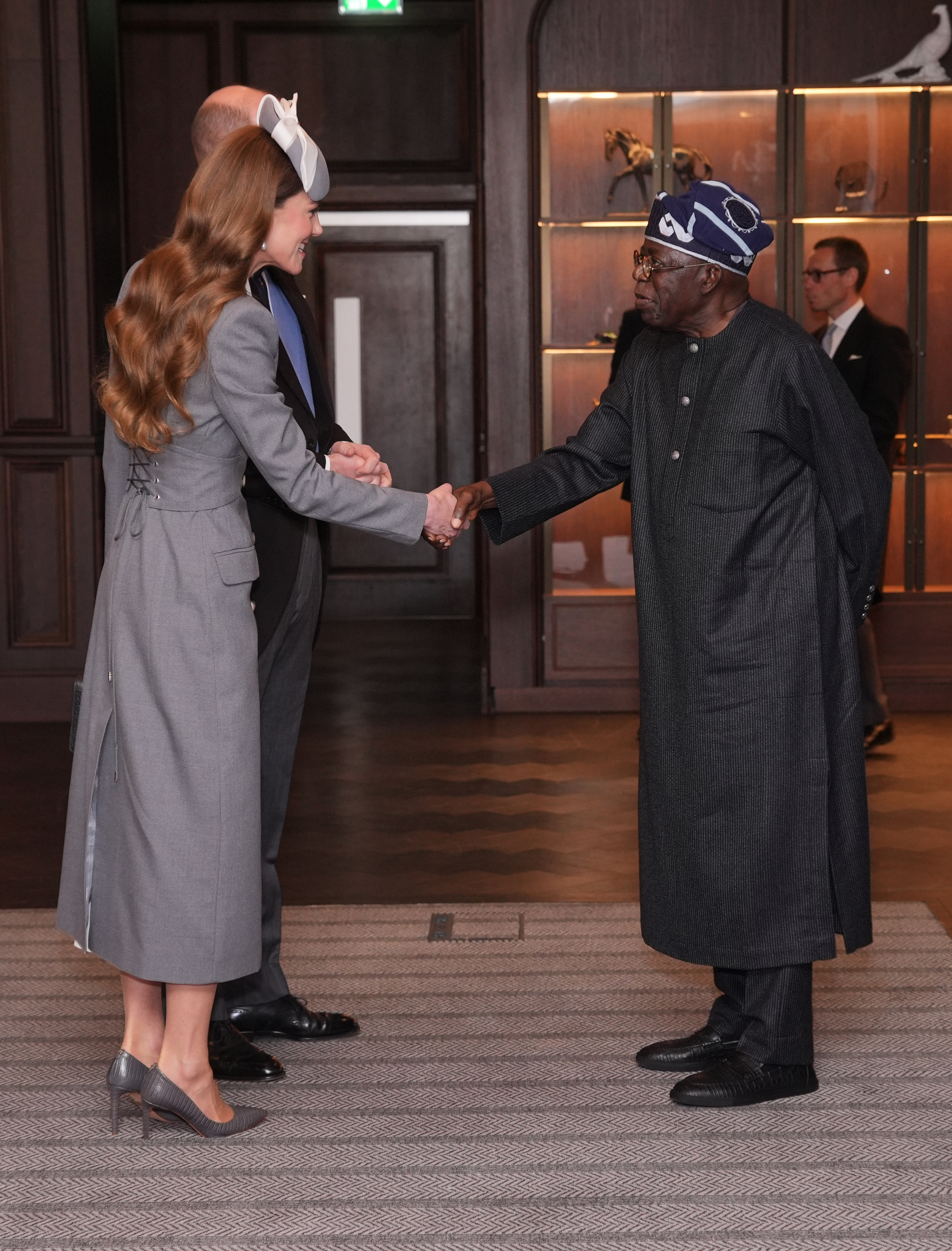 WINDSOR, ENGLAND - MARCH 18: Prince William, Prince of Wales and Catherine, Princess of Wales receive President of Nigeria Bola Ahmed Tinubu at the Fairmont Windsor Park hotel in Englefield Green, on day one of their state visit to the UK, on March 18, 2026 in Windsor, England. President Bola Tinubu and First Lady Oluremi Tinubu are conducting a historic State Visit to the United Kingdom, marking the first state visit by a Nigerian leader in 37 years and the first to be hosted at Windsor Castle. (Photo by Yui Mok - Pool/Getty Images)