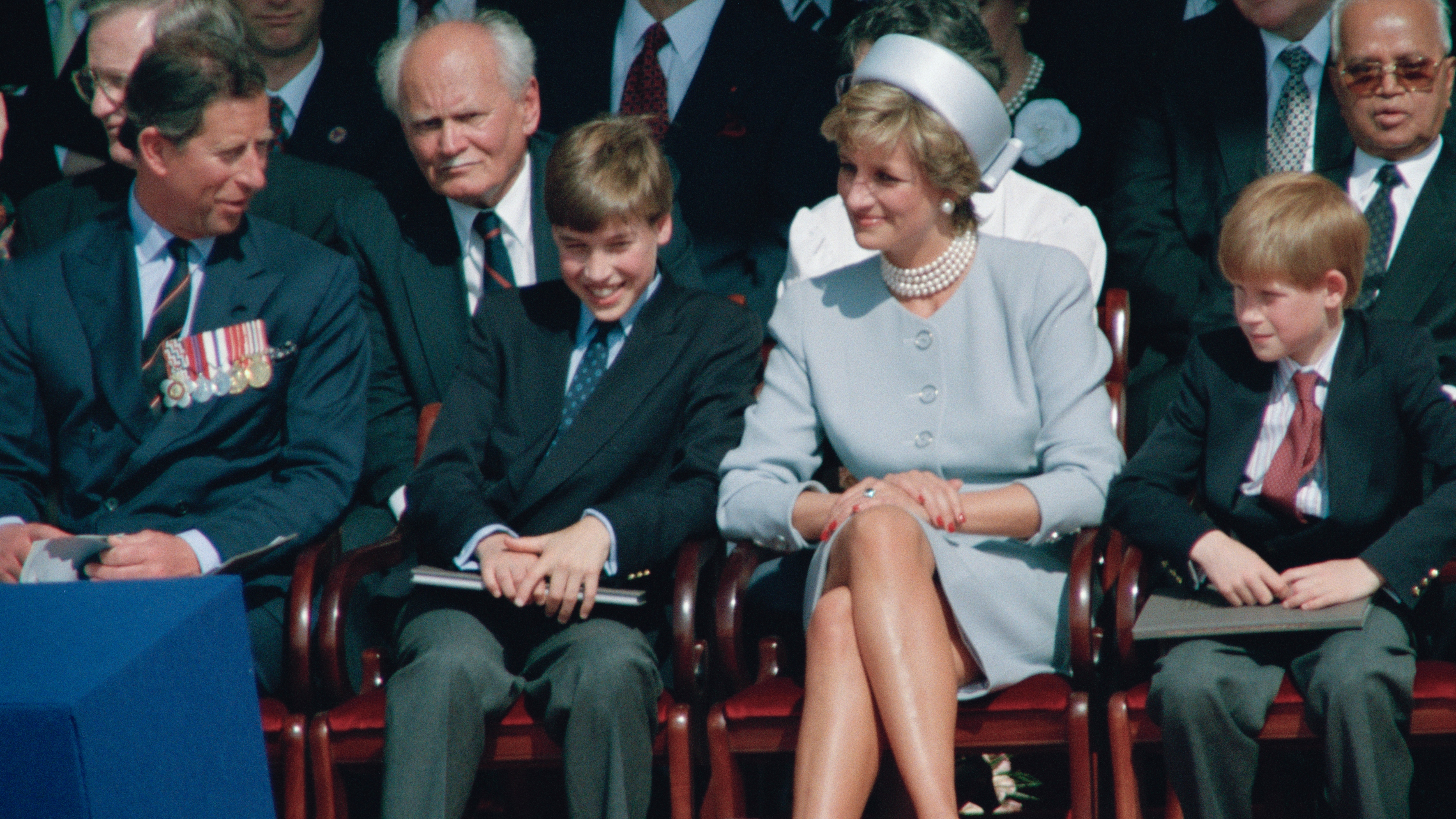 King Charles, Prince William, Princess Diana and Prince Harry sit together in 1995