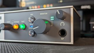 Close up of the headphone socket and main monitor volume knob of the Universal Audio Volt 1 audio interface
