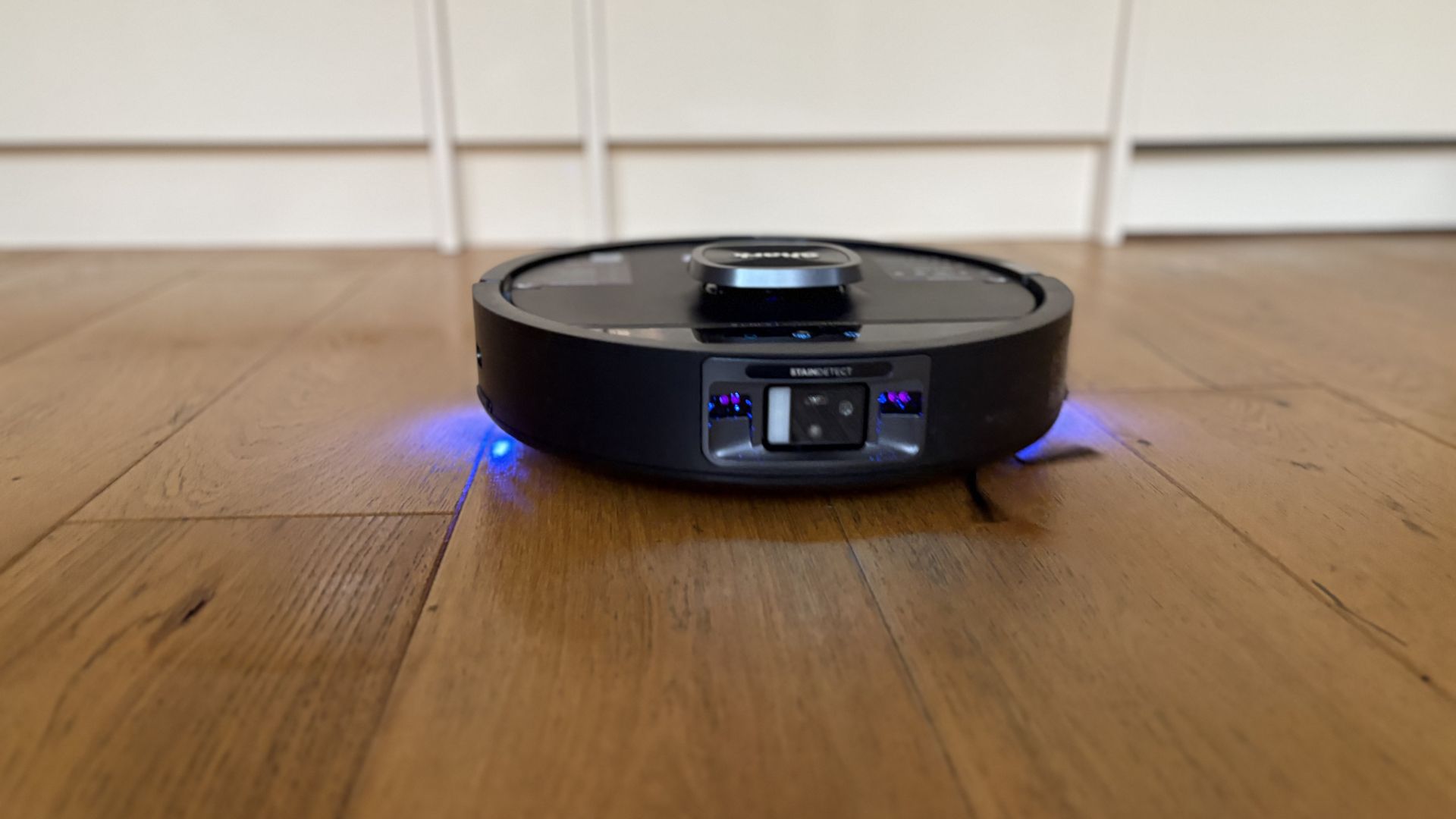 Testing the Shark PowerDetect UV Reveal Robot Vacuum + Mop with its lights on