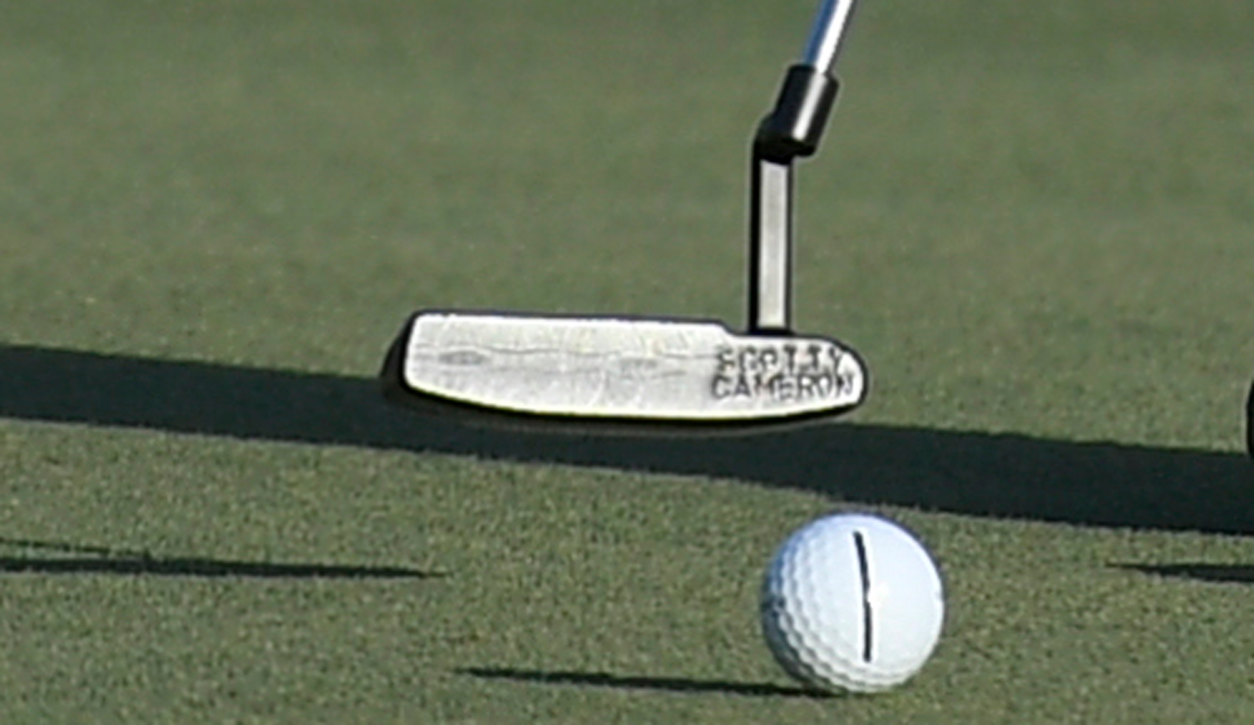 A close-up of Si Woo Kim's putter
