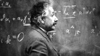 Albert Einstein at a chalk board