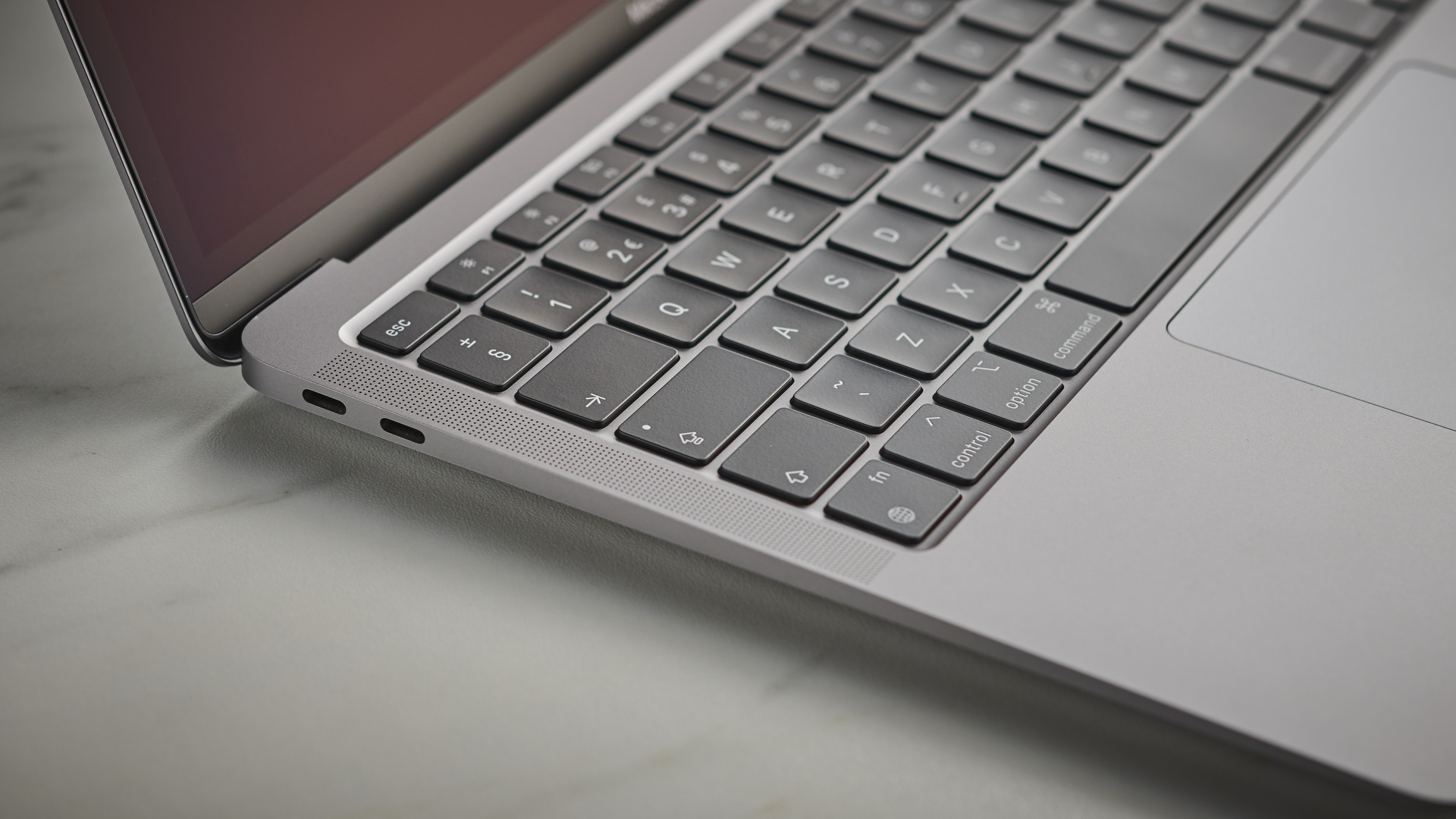 Apple MacBook Air (M1,2020) on a gray surface