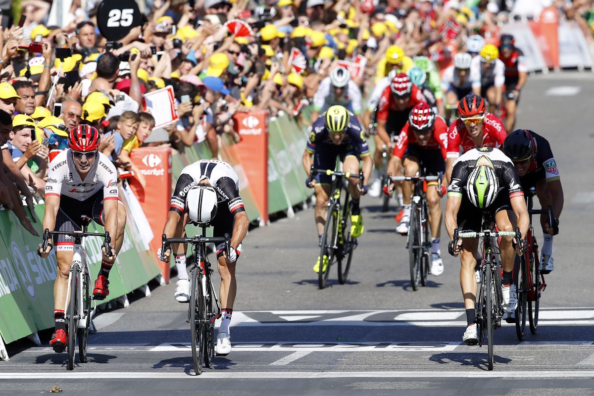 John Degenkolb, Michael Matthews and Edvald Boasson Hagen throw their bikes at the finish of stage 16