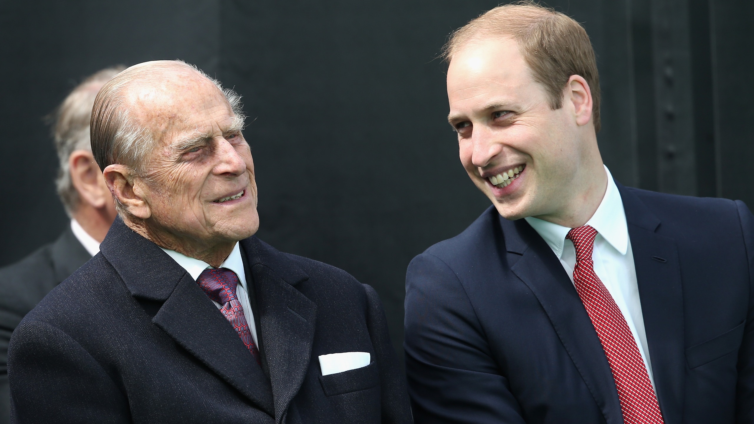 Prince Philip, Duke of Edinburgh chats to Prince William at a Magna Carta 800th Anniversary Commemoration Event on June 15, 2015