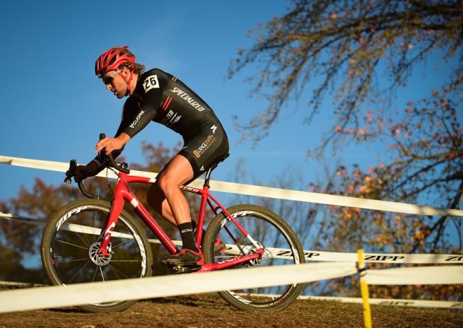 Cody Kaiser (Lange Twins-Specialized) riding across the top of a ridge.