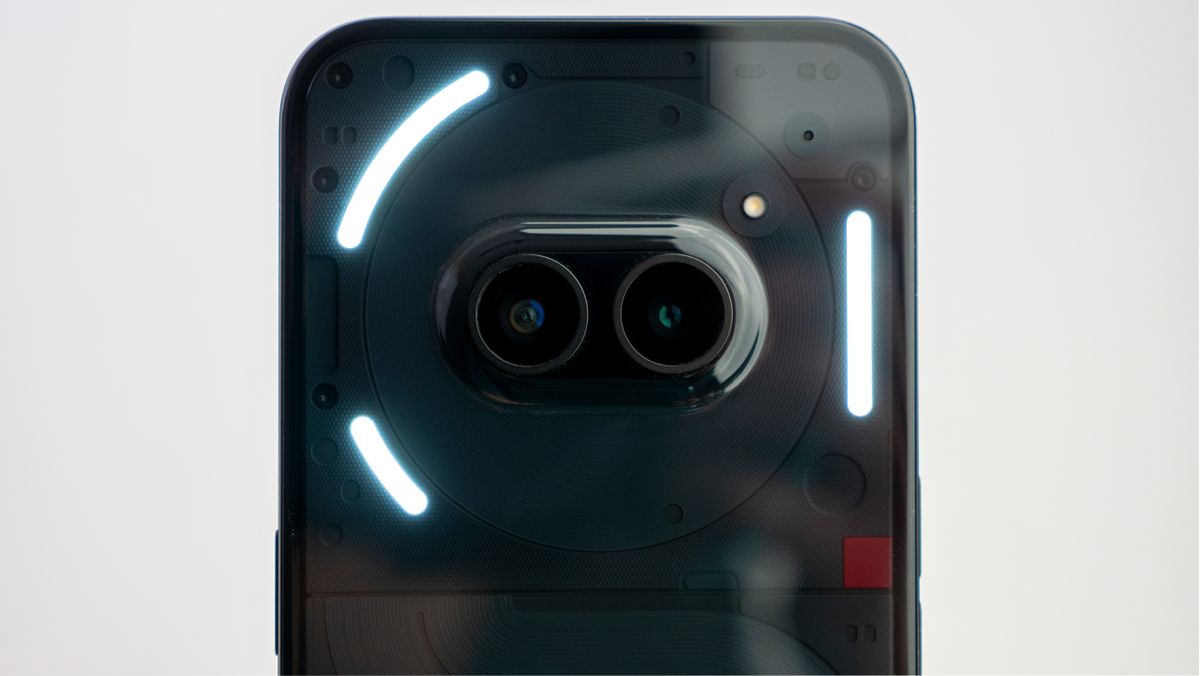 The camera island on the back of the Nothing Phone (2a) with the glyph lights illuminated