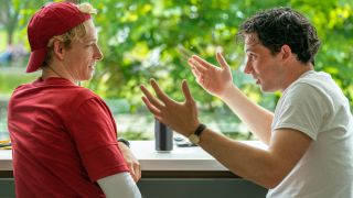 Mike Faist and Josh O'Connor talking in the dining hall in Challengers.