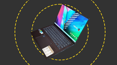 The Asus Zenbook 14 OLED on the ITPro background