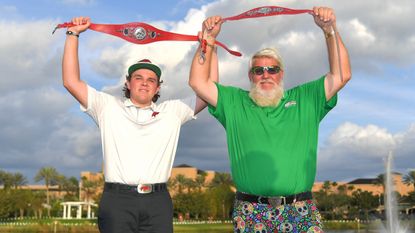 John Daly II and John Daly hold their belts after winning the 2021 PNC Championship in Florida