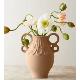 earthenware vase in classic style with flowers
