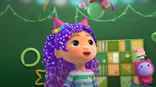 Gabby dressed for a party in Gabby's Dollhouse