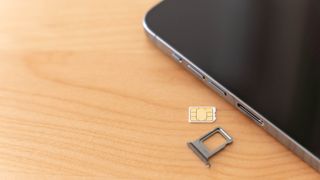 The Sim card and port removed from a phone
