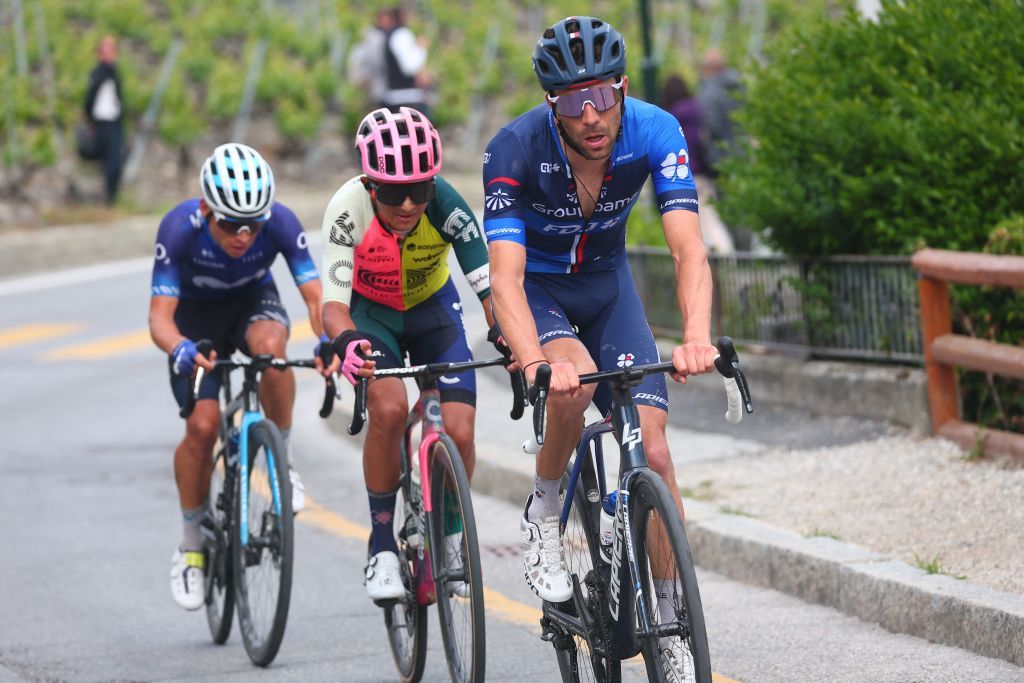 From R Groupama FDJs French rider Thibaut Pinot EF EducationEasyPosts Ecuadorian rider Jefferson Alexander Cepeda and Movistar Teams Colombian rider Einer Rubio cycle during their breakaway in the last 10 kilometers of the thirteenth stage of the Giro dItalia 2023 cycling race which start was transfered from Borgofranco dIvrea to Le Chable due to bad weather conditions and CransMontana on May 19 2023 Photo by Luca Bettini AFP Photo by LUCA BETTINIAFP via Getty Images
